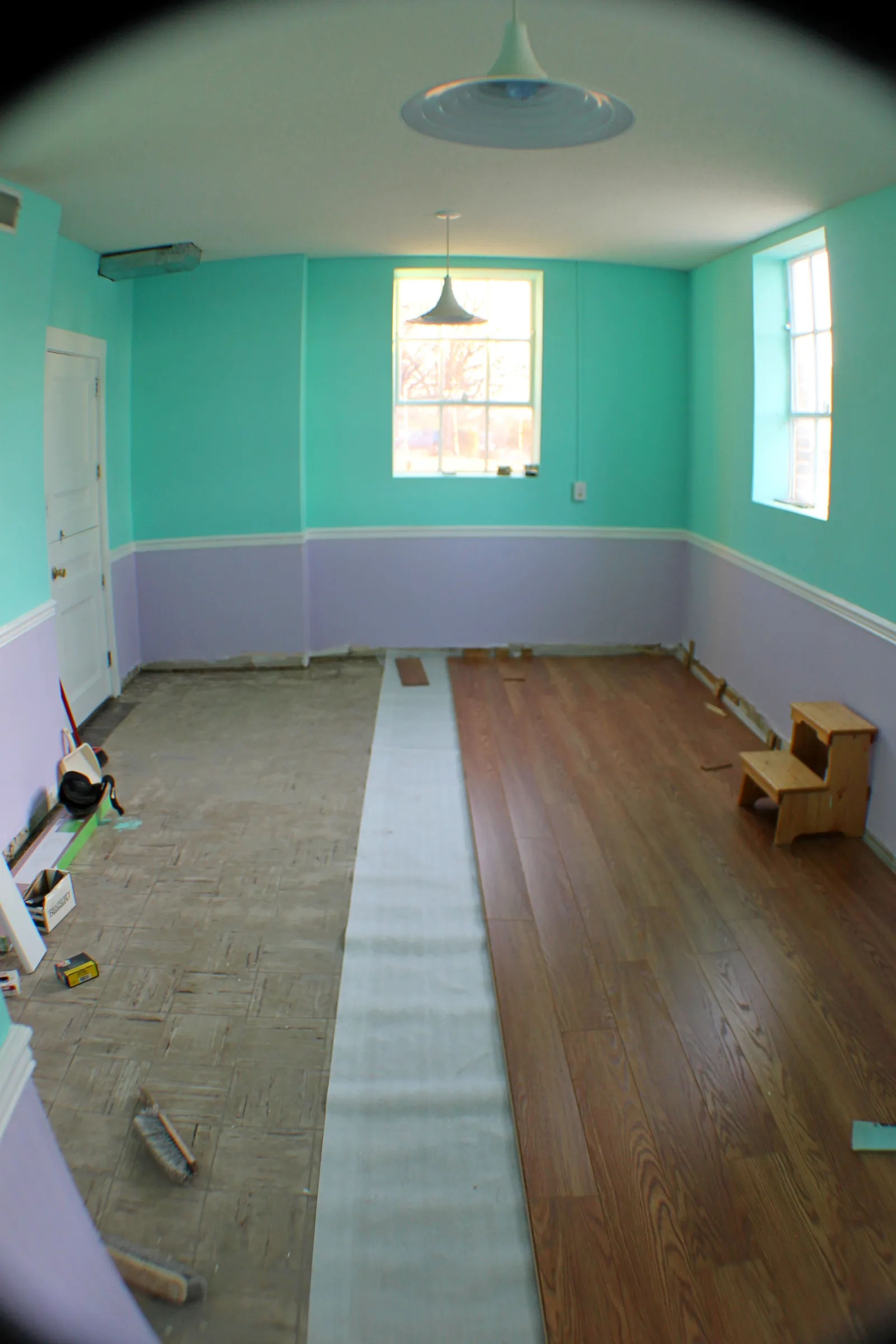Laminate floor assembly requires fitting planks with tongue and groove connections
