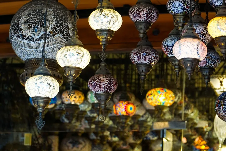 Stunning display of traditional Turkish mosaic lamps in a vibrant Istanbul market.