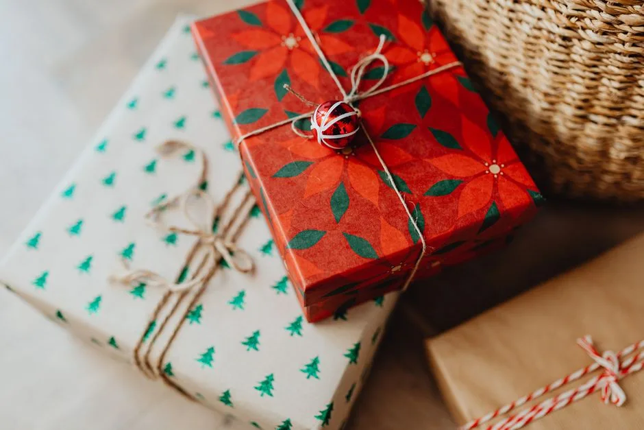 Beautifully wrapped Christmas gifts with vibrant paper and twine.