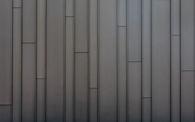 Sleek vertical metal panel wall showcasing a modern minimalist industrial design.