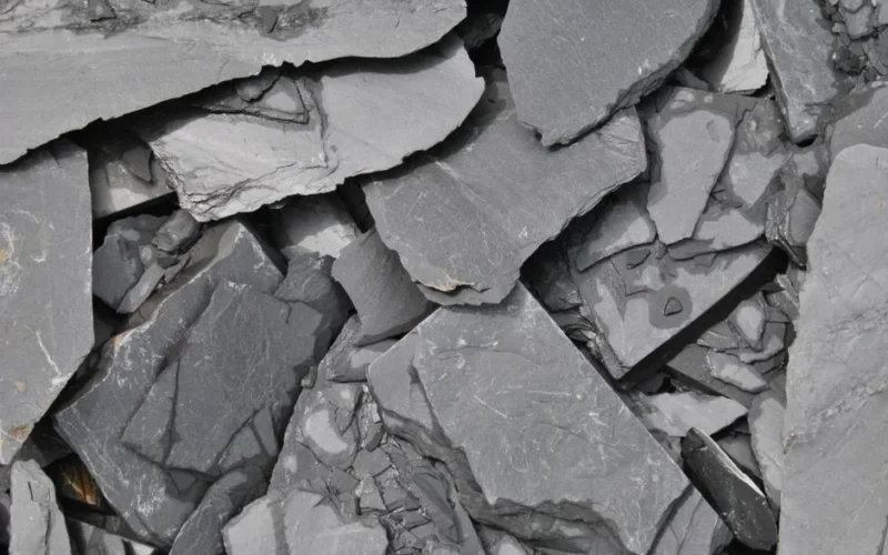 A detailed close-up of broken slate rocks providing a raw, natural texture.